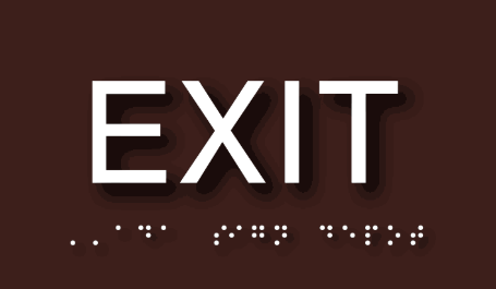 An exit sign using proper font choice on a contrasting background for easy readability. 